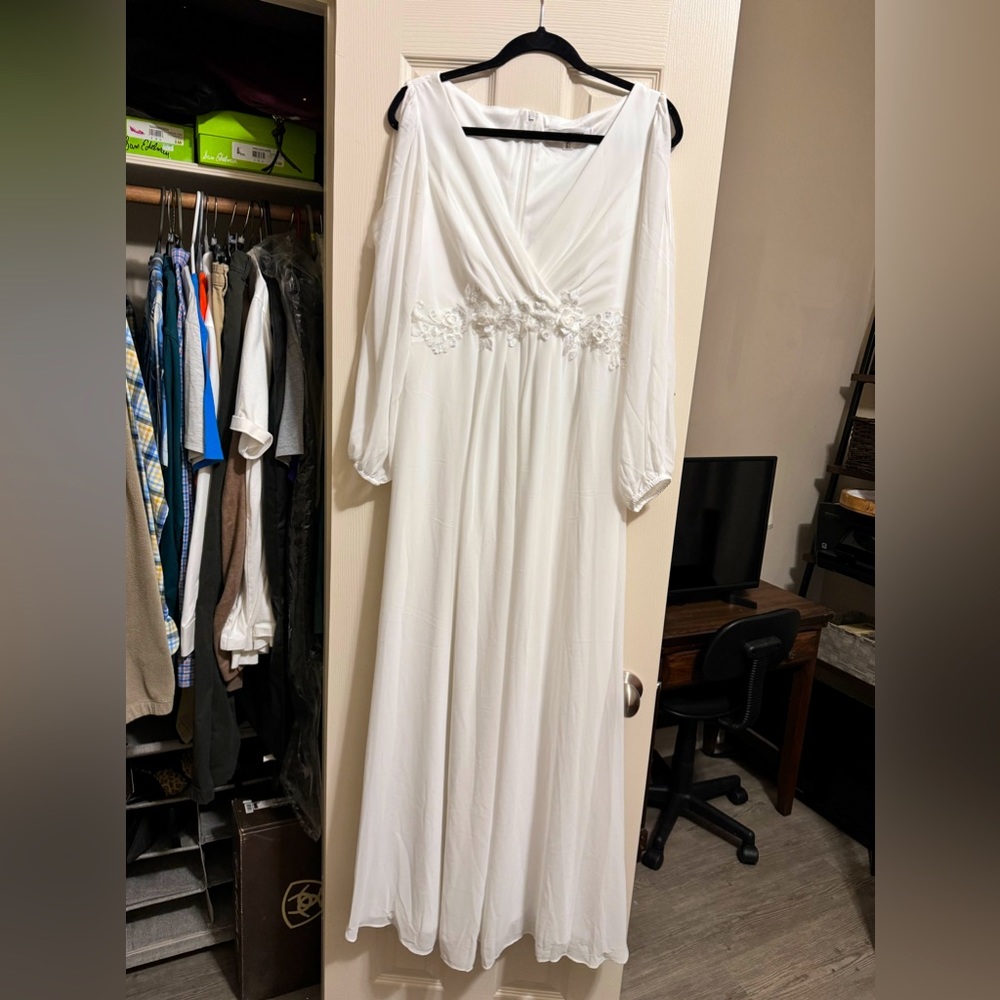 Flowing, ivory dress.